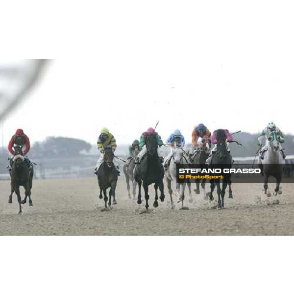 last few meters to the line - Mirco Demuro on Erasmus (3rd from left) leads the group in the Premio Flossy on the new all-weather race track at Capannelle Rome, 7th october 2005 ph. Stefano Grasso