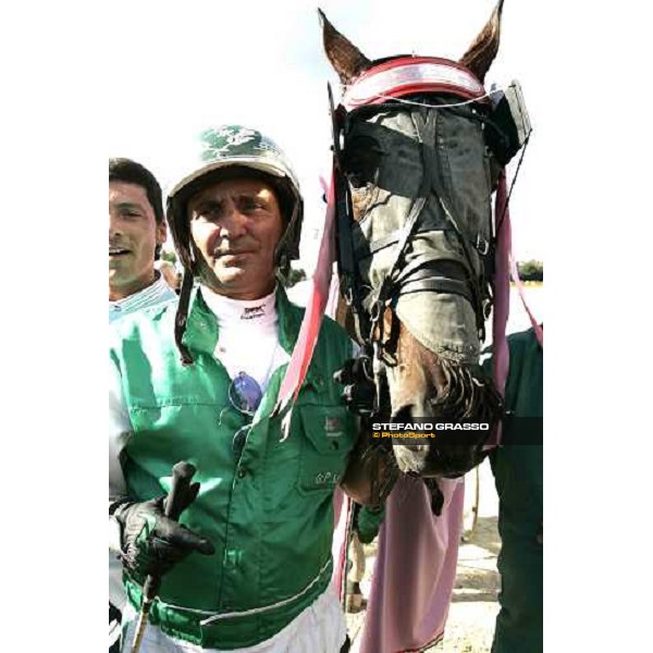 Peppino Maisto with Fantastica Star in the parade ring of Oaks del Trotto Roma Tordivalle 9th october 2005 ph. Stefano Grasso