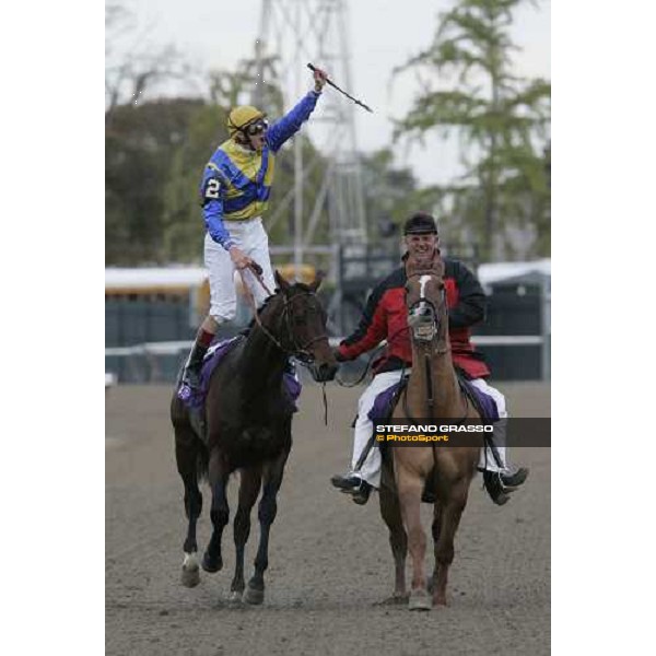 Christophe Soumillon in triumph with Shirocco after winning the John Deere Breeders\' Cup Turf New York, 29th october 2005 ph. Stefano Grasso