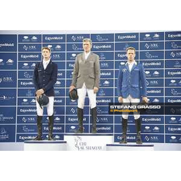 The podium of Gran Prix.Beerbaum,Ahlmann and Deusser Doha,5th march 2016 ph.©.CHI Al Shaqab/Stefano Grasso all rights reserved
