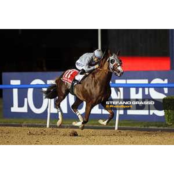 California Chrome with Victor Espinoza up wins the Dubai World Cup Dubai-Meydan racecourse 26th march 2016 ph.Frank Sorge/Grasso