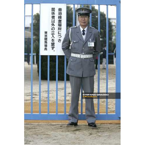 a guardian at the gate of the quarantine stables at Fuchu racetrack. Tokyo, 23rd november 2005 ph. Stefano Grasso