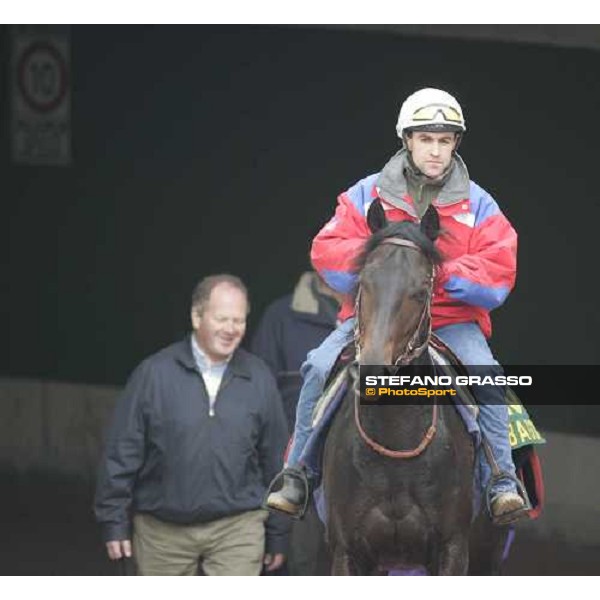 Sebastiene Quennesson and Bago comes back after morning track works at Fuchu racetrack, followed by Niarchos family manager, Alan Cooper Tokyo, 23rd november 2005 ph. Stefano Grasso