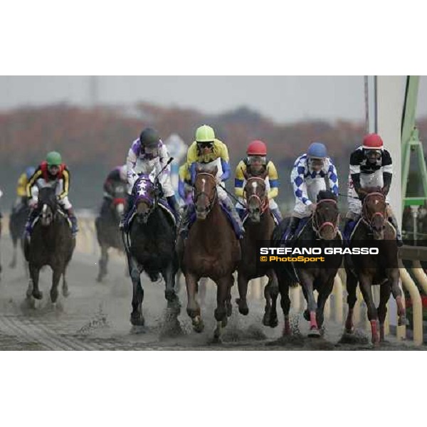 Yutaka Take on Kane Hekily wins the Japan Cup dirt beating Seeking The Dia and Star King Man - Frankie Dettori behind at left 7th placed Tokyo, 26th november 2005 ph. Stefano Grasso