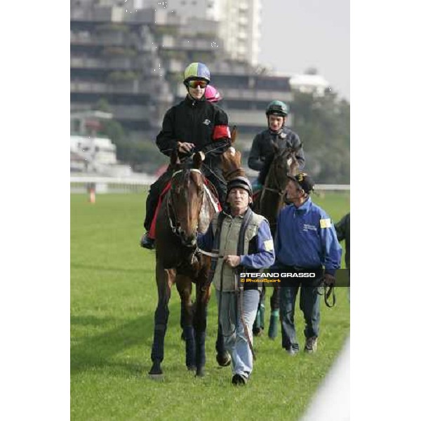 Christophe Patrice Lemaire on Touch of Land after morning works at Sha Tin race track Hong Kong, 9th dec. 2005 ph. Stefano Grasso