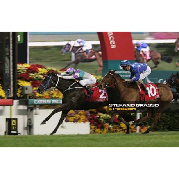 Anthony Delpech on Vengeance of Rain wins the Cathay Pacific Hong Kong Cup at Sha Tin race course, beating Christophe Soumillon on Pride Hong Kong, 11th dec. 2005 ph. Stefano Grasso