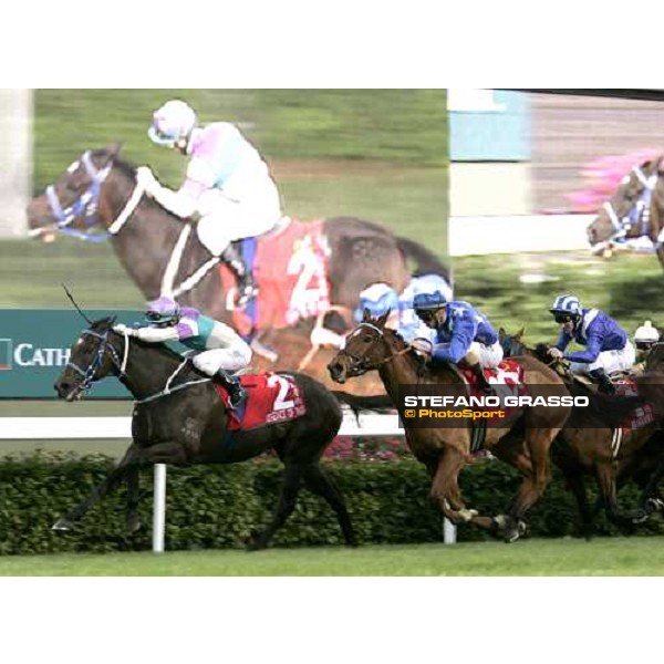at few meters to the line, Anthony Delpech on Vengeance of Rain leads the group and wins the Cathay Pacific Hong Kong Cup at Sha Tin race course Hong Kong, 11th dec. 2005 ph. Stefano Grasso