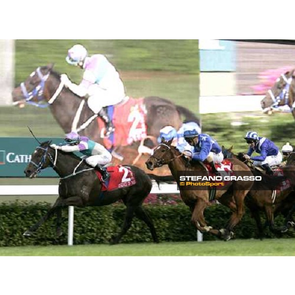 at few meters to the line, Anthony Delpech on Vengeance of Rain leads the group and wins the Cathay Pacific Hong Kong Cup at Sha Tin race course Hong Kong, 11th dec. 2005 ph. Stefano Grasso