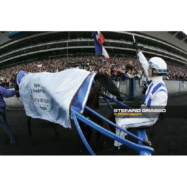 Christophe Gallier with Jag de Bellouet thanks the public of Vincennes, after winning the 85¡ Grand Prix d\' Amerique Paris, 29th january 2006 ph. Stefano Grasso