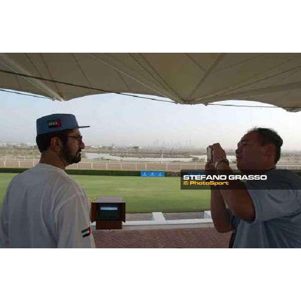 Sheikh Mohammed Bin Rashid Al Maktoum and japanese photographer Al Quoz - Godolphin Stables Dubai march 24 2004 ph. Stefano Grasso