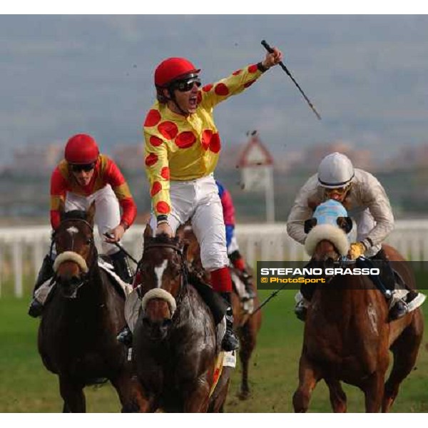 \'Mirko Simonaggio exulting on Miss Vega, immediately after the winning post of Premio Ubaldo Pandolfi Rome, nov. 16 2003-ph.Stefano Grasso\' 