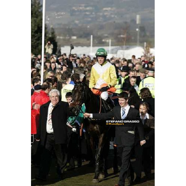 Andrew J. McNamara on Newmill winners of The Queen Mother Champion Steeple Chase, enters in the winner circle with the owner Mr. Hayes Cheltenham, 15th march 2006 ph. Stefano Grasso
