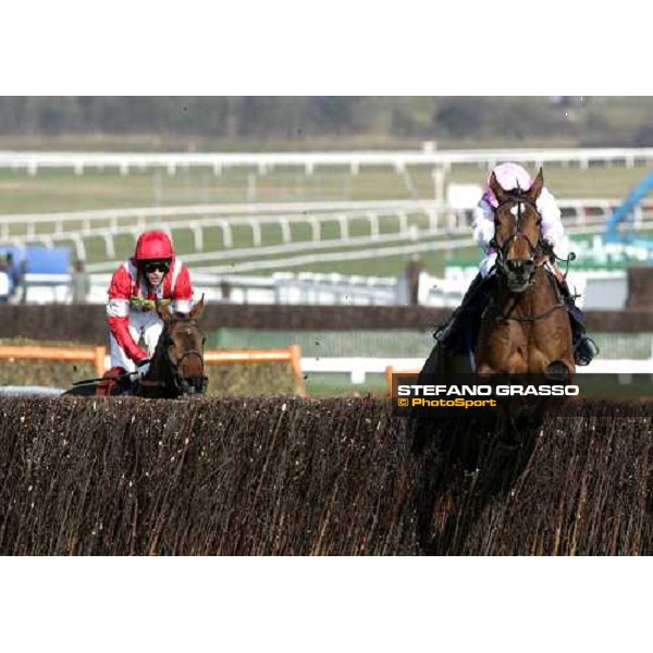 Barry J.Geraghty on Star de Mohaison jumps the last fence and go to win the Royal \' SunAlliance Steeple Chase Cheltenham, 15th march 2006 ph. Stefano Grasso
