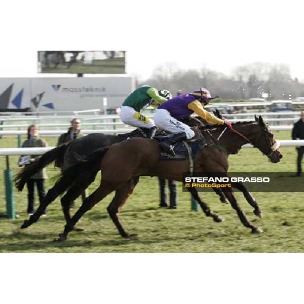 Paul Carberry with Nicanor flies to the line and go to win The Royal and SunAlliance Novices\' Hurdle Race, beating Ruby Walsh on Denman, inside. Cheltenham, 15th march 2006 ph. Stefano Grasso