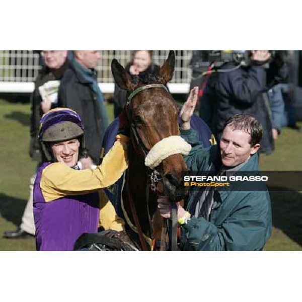 Paul Carberry and the groom congratulates with Nicanor winner of The Royal and SunAlliance Novices\' Hurdle Race Cheltenham, 15th march 2006 ph. Stefano Grasso