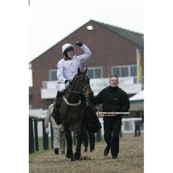 A.P.McCoy celebrates on Black Jack Ketchum after winning the Brit Insurance Novice\'s Hurdle Race Cheltenham, 17th march 2006 ph. Stefano Grasso