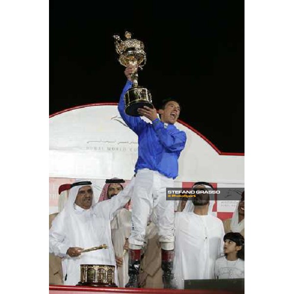 Frankie Dettori , Sheick Mohamed and Saeed Bin Suroor celebrates the triumph in the winner circle of the Dubai World Cup 2006 Nad El Sheba, 25th march 2006 ph. Stefano Grasso