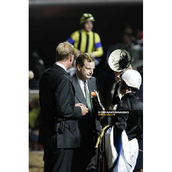 Oujia Board\'s connection with Lord Derby speaking with Kieren Fallon after the race. In the background the winner Christophe Patrick Lemaire on Heart\'s Cry Nad El Sheba, 25th march 2006 ph. Stefano Grasso