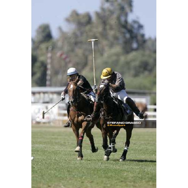 Juan JosŽ BranŽ of Mochi Craft Polo Team vs. Paolo Grillini of Ruinart Champagne Costa Smeralda Jaeger-LeCoultre Polo Cup Porto Cervo, 30th april 2006 ph. Stefano Grasso