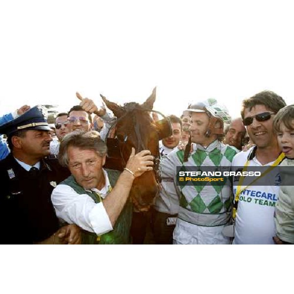 Andrea Guzzinati with Malabar Circle As after the triumph of Gran Premio Lotteria di Agnano.Close to him Gianluca Risso owner of the horse Napoli, 7th may 2006 ph. Stefano Grasso