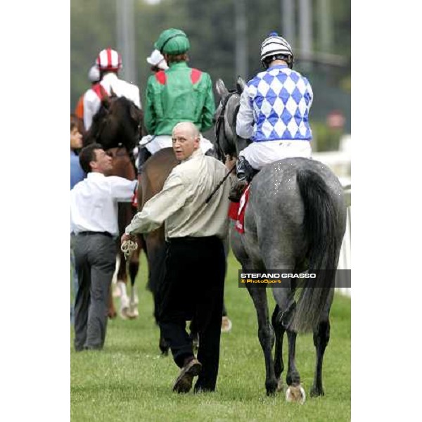 Mirco Demuro on Vol de Nuit parades before the Gran Premio di Milano behind Christophe Soumillon on Shawanda Milan, 18th june 2006 ph. Stefano Grasso