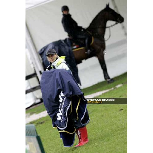 Fei World Equestrian games - Aachen training session the groom of Quintero 4 and Jonella Ligresti on Quinta 27 in the background Aachen, 28th august 2006 ph. Stefano Grasso