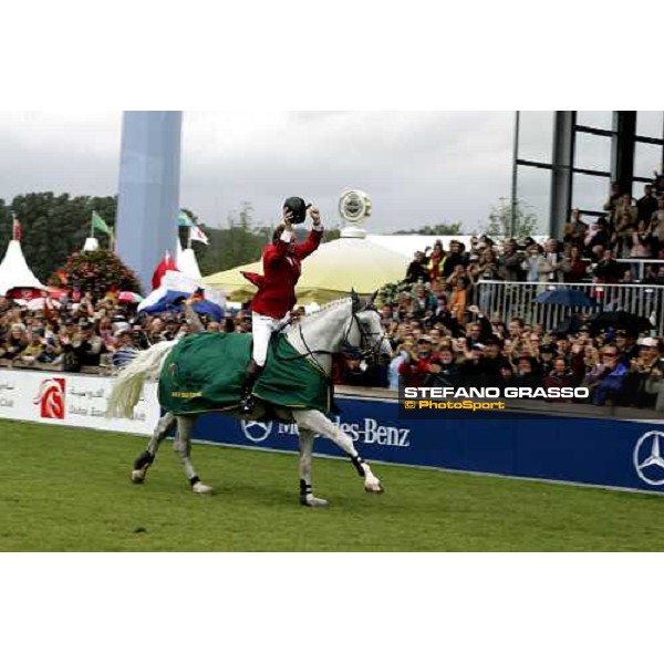 Fei Rolex World Champion Jos Lansink on Cavalor Cumano parades in triumph after winning the gold medal Aachen, 3rd september 2006 ph. Stefano Grasso