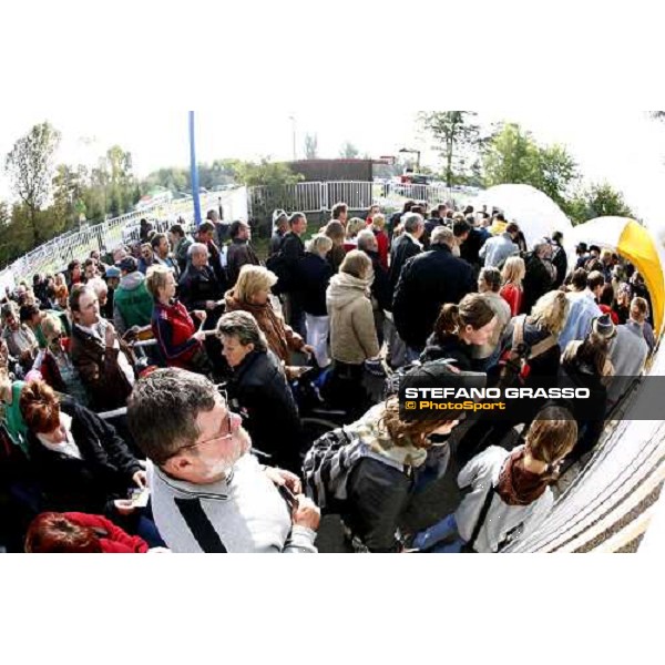 racegoers enter at Pardubice racetrack for the 116.¡ Velka Pardubicka Pardubice race track, 8th october 2006 ph. Stefano Grasso