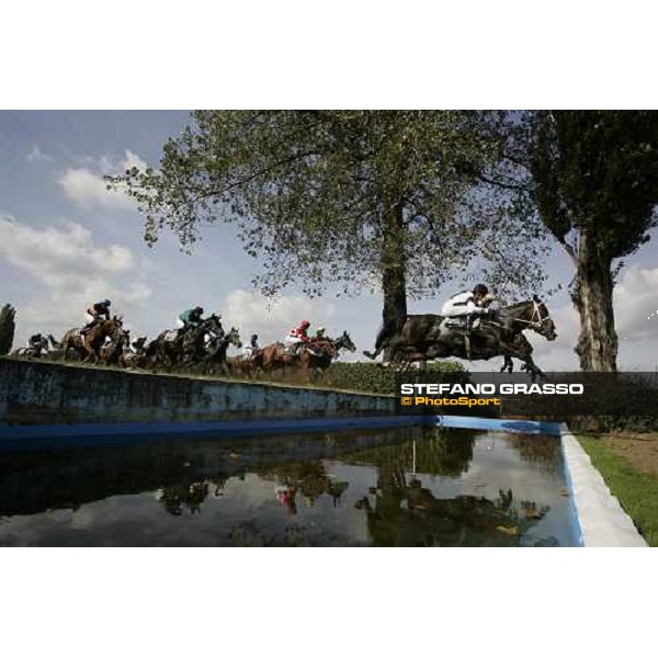 horses jump teh snakeditch at Pardubice racetrack for the 116¡ Velka Pardubicka PArdubice, 8th october 2006 ph. Stefano Grasso