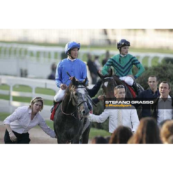 Frankie Dettori on Cherry Mix and Dario Vargiu on Fair NAshwan come back to the winner circle of Gran Premio del Jockey Club Milan San Siro 15th october 2006 ph. Stefano Grasso