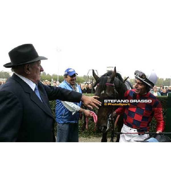 a caress from Emilio Balzarini to Ramonti with Endo Botti smiling after winning the Gran Premio Vittorio Di Capua Milan, San Siro 14 october 2006 ph. Stefano Grasso