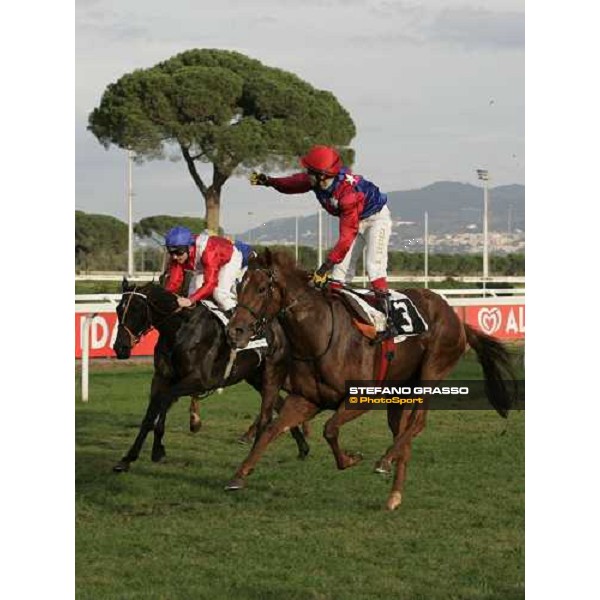 Karoly Kerekes on Floriot wins the Premio Lydia Tesio beating Seb Sanders on Confidential Lady Rome Capannelle, 22nd october 2006 ph. Stefano Grasso