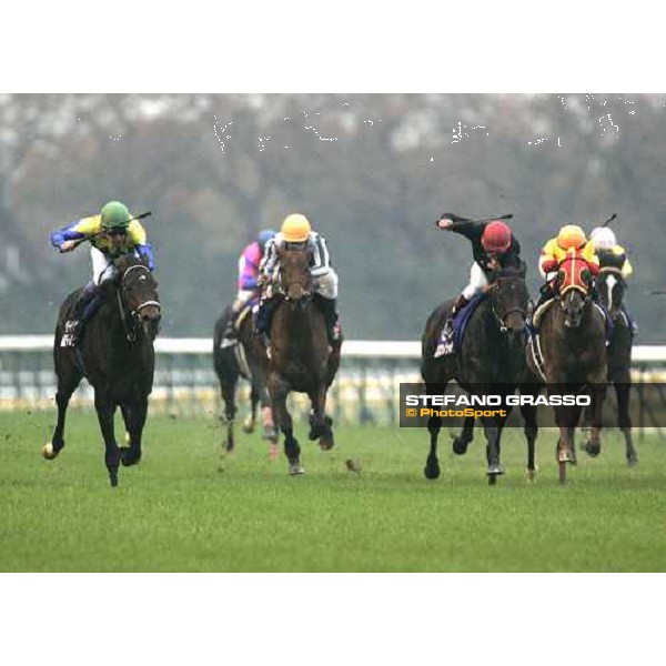 at last 100 meters to the line Yutaka Take on Deep Impact (left) leads and wins The Japan Cup 2006 at Fuchu racecourse, beating Dream Passport and Oujia Board with Freedonia 7th placed Tokyo, 26th nov.2006 ph. Stefano Grasso