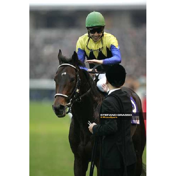 Yutaka Take celebrates with his groom the triumph in the Japan Cup 2006 at Fuchu racecourse Tokyo, 26th nov.2006 ph. Stefano Grasso