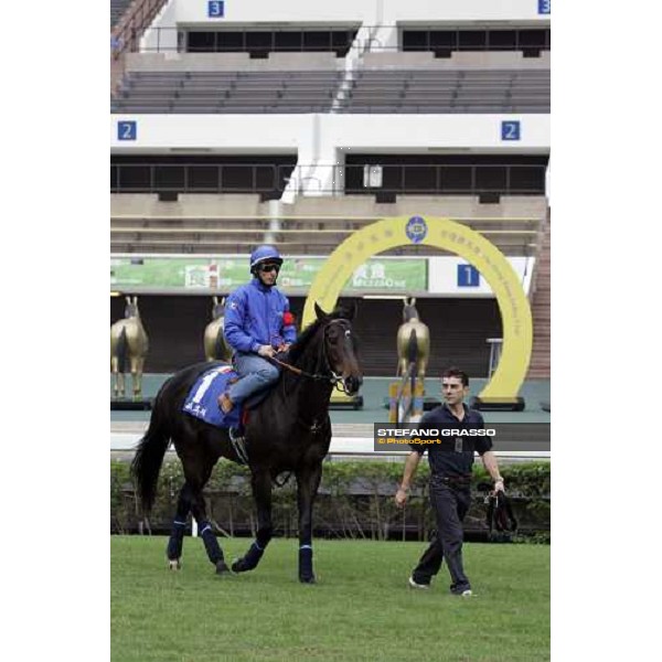 Endo Botti on Ramonti and Jonathan enter the track for morning works at Sha Tin racecourse Hong Kong, 7th dec. 2006 ph. Stefano Grasso