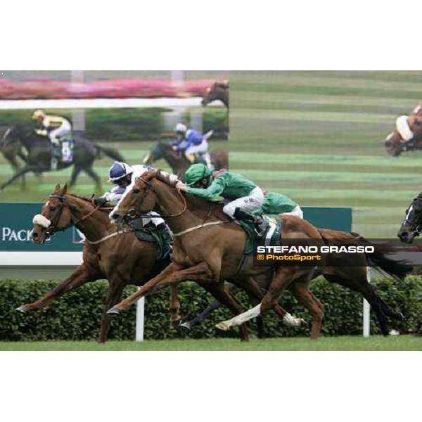 Dean McKeown on Collier Hill wins the Cathay Pacific Hong Kong Vase beating Mick Kinane on Castoria Hong Kong, 10th dec. 2006 ph. Stefano Grasso
