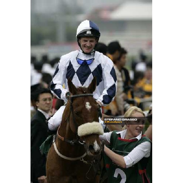 Dean McKeown on Collier Hill wins the Cathay Pacific Hong Kong Vase beating Mick Kinane on Castoria and enters in the winner circle Hong Kong, 10th dec. 2006 ph. Stefano Grasso