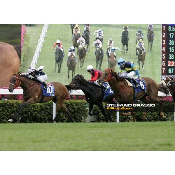 last few meters for Endo Botti on Ramonti, The Duke and Armada in the Cathay Pacific Hong Kong Mile. Hong Kong, 10th dec. 2006 ph. Stefano Grasso