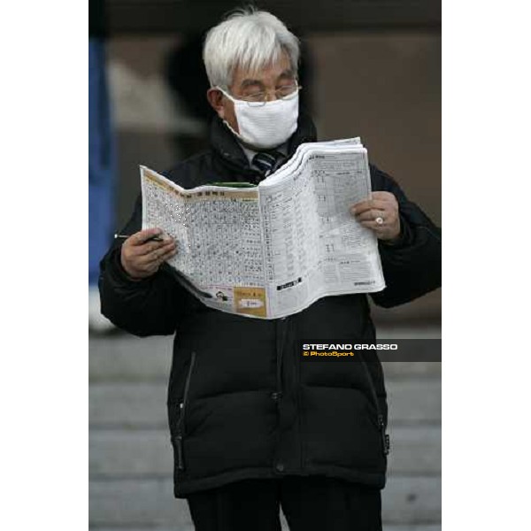 racegoer at Seoul race park Seoul, 16th dec. 2006 ph. Stefano Grasso