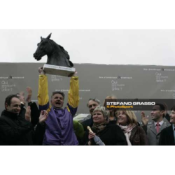 Pierre Levesque stands the trophy after winning the Grand Prix d\'Amerique 2007, sorrounded by his family Paris Vincennes, 28th january 2007 ph. Stefano Grasso