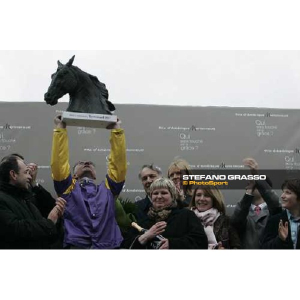 Pierre Levesque stands the trophy after winning the Grand Prix d\'Amerique 2007, sorrounded by his family Paris Vincennes, 28th january 2007 ph. Stefano Grasso