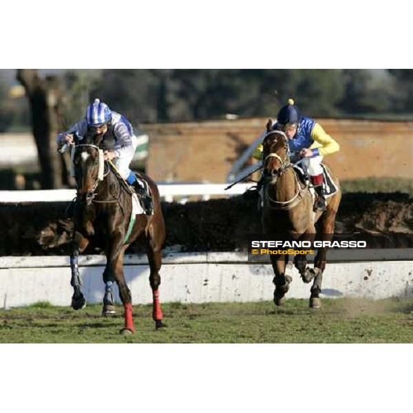Dirck Fuhrmann on Amica jumps the last fence and goes to win the Premio XXIX Steeple Chase delle Capannelle followed by P.A.Johnson on Hvytkyj Rome, 4th february 2007 ph. Stefano Grasso