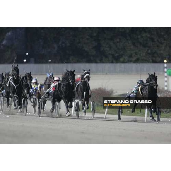 on the straight of San Siro, Giuseppe Ruocco and Dominatore D\'Orio in the middle winners of Gran Premio Encat \'Memorial Fausto Branchini\', with Pippo Gubellini and Frisky Bieffe(left) and Andrea Guzzinati with Express Road (right) Milan, San Sir