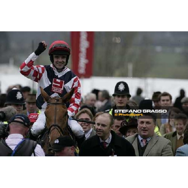 Ruby Walsh comes back in triumph on Taranis after winning the Ryanair Chase with at right the trainer Paul Nicholss Cheltenham, The Festival, 3rd day. 15th march 2007 ph. Stefano Grasso