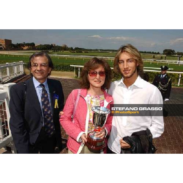 Mrs. and Mr. Agostini and Claudio Baglioni\'s son Premio Presidente della Repubblica Rome Capannelle 16th may 2004 ph.Stefano Grasso