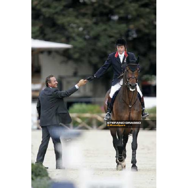 Uliano Vezzani, chef de piste congratulates with John Whitaker on Peppermill winners of Gran Premio Roma - Loro Piana at 75.¡ Csio Piazza di Siena Rome, 27th may 2007 ph. Stefano Grasso