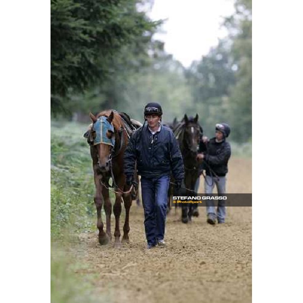 a 2 years old coming back with his training jockey at Eric Libaud\'s training center La Richerie, 26th june 2007 ph. Stefano Grasso