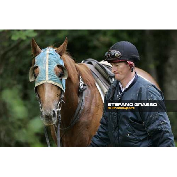 a 2 years old coming back with his training jockey at Eric Libaud\'s training center La Richerie, 26th june 2007 ph. Stefano Grasso