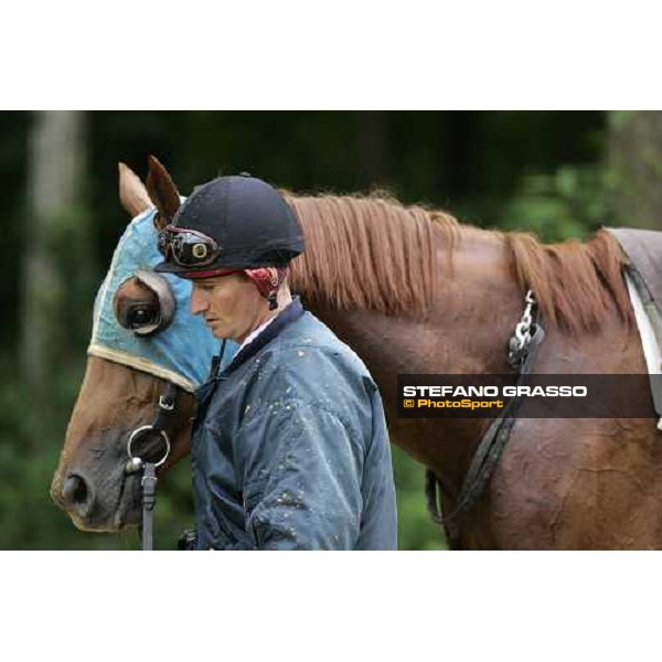 a 2 years old coming back with his training jockey at Eric Libaud\'s training center La Richerie, 26th june 2007 ph. Stefano Grasso