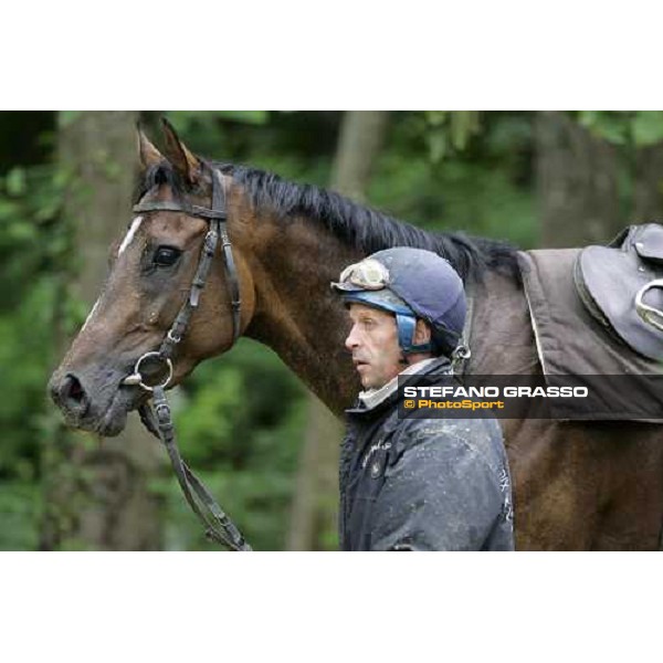 a 2 years old coming back with his training jockey at Eric Libaud\'s training center La Richerie, 26th june 2007 ph. Stefano Grasso